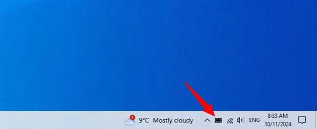 Нажмите или коснитесь значка батареи на панели задач.